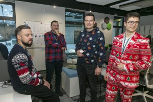 BitPeak team embracing holiday spirit in festive attire