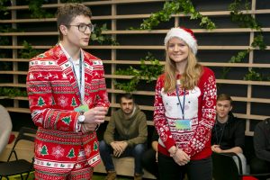 BitPeak team embracing the holiday season wearing festive outfits